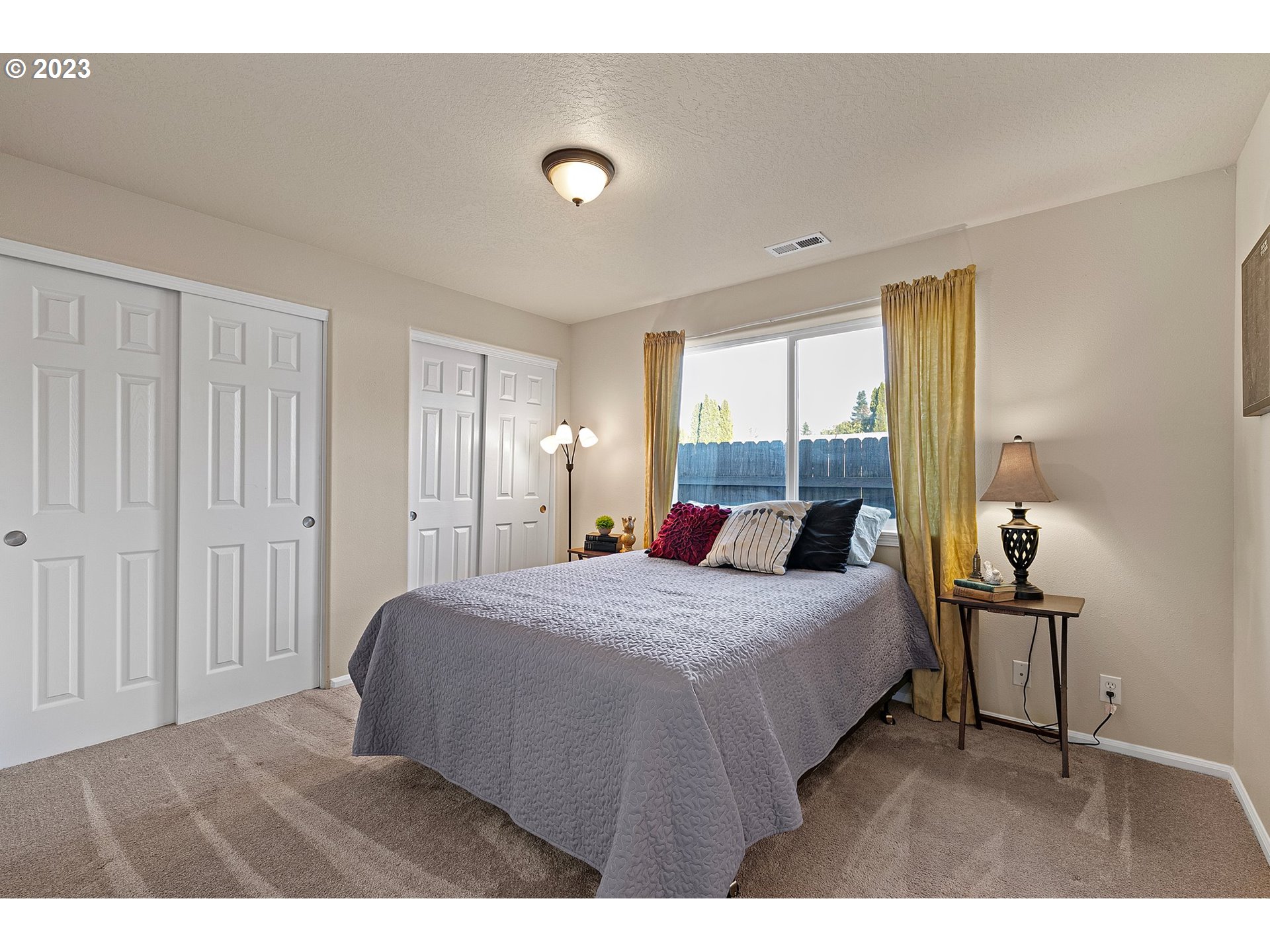 340 54th Street Springfield, OR 97478 - Photo 24 of 40 a bedroom with a bed and a window
