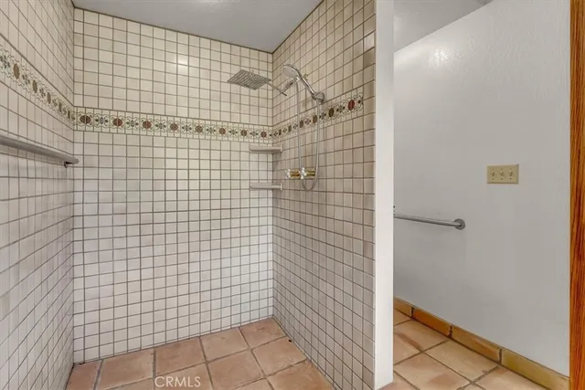 a bathroom with a sink mirror vanity and toilet