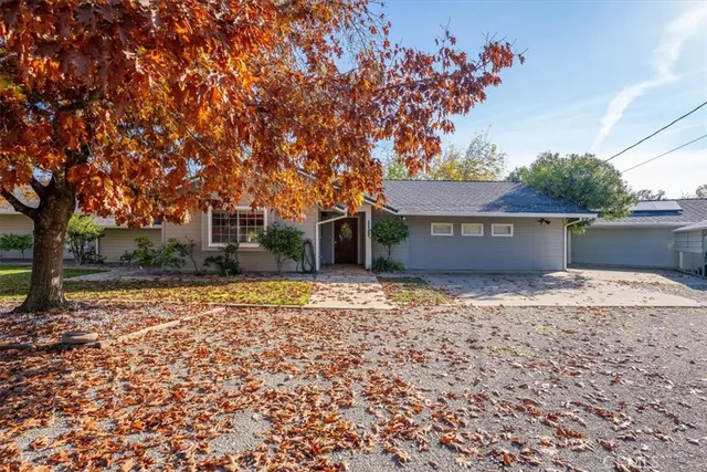 a house view with a backyard space