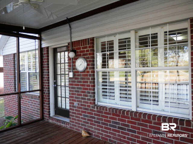 229 Spring Lake Drive Fairhope, AL 36532 - Photo 16 of 21 Porch has pull down shade to block the afternoon sun!
