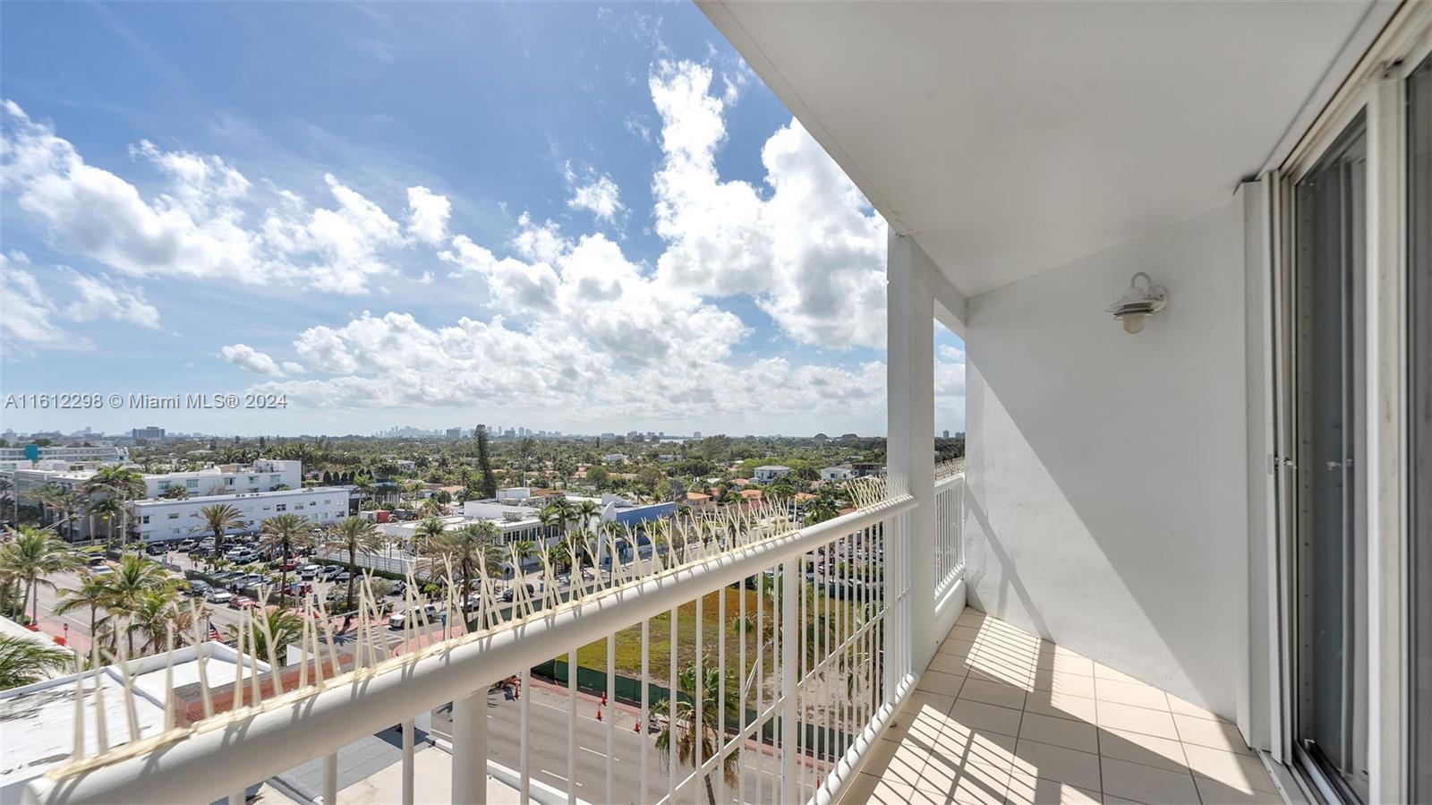 9341 Collins Avenue, Unit 707 Surfside, FL 33154 - Photo 29 of 55 a view of a city from a balcony