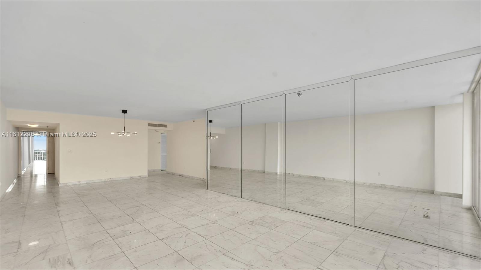 9341 Collins Avenue, Unit 707 Surfside, FL 33154 - Photo 30 of 55 a view of an empty room