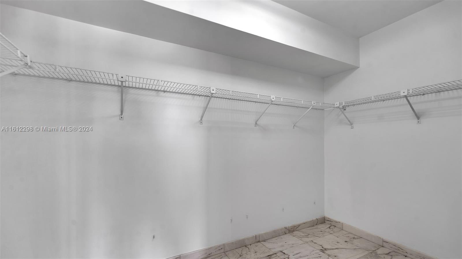 9341 Collins Avenue, Unit 707 Surfside, FL 33154 - Photo 41 of 55 a view of a room