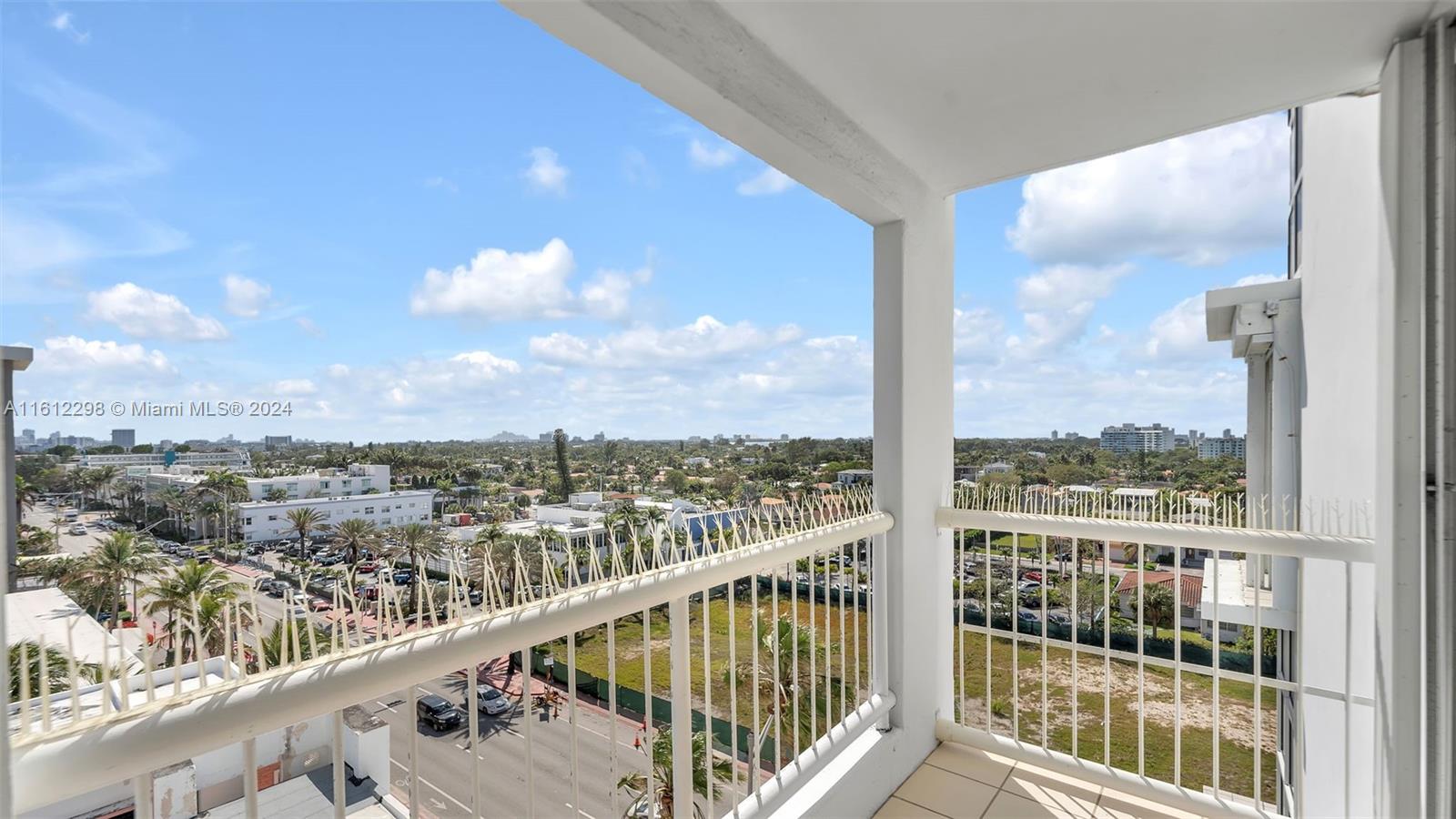 9341 Collins Avenue, Unit 707 Surfside, FL 33154 - Photo 46 of 55 a view of a city from a balcony