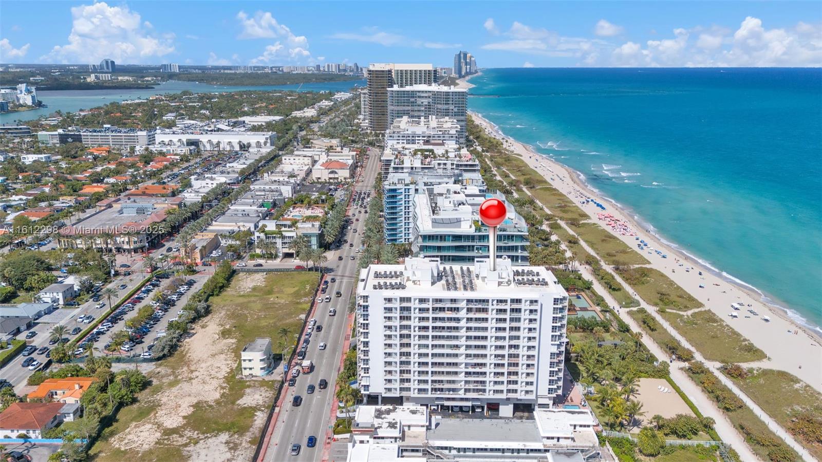 9341 Collins Avenue, Unit 707 Surfside, FL 33154 - Photo 53 of 55 a view of a city with tall buildings