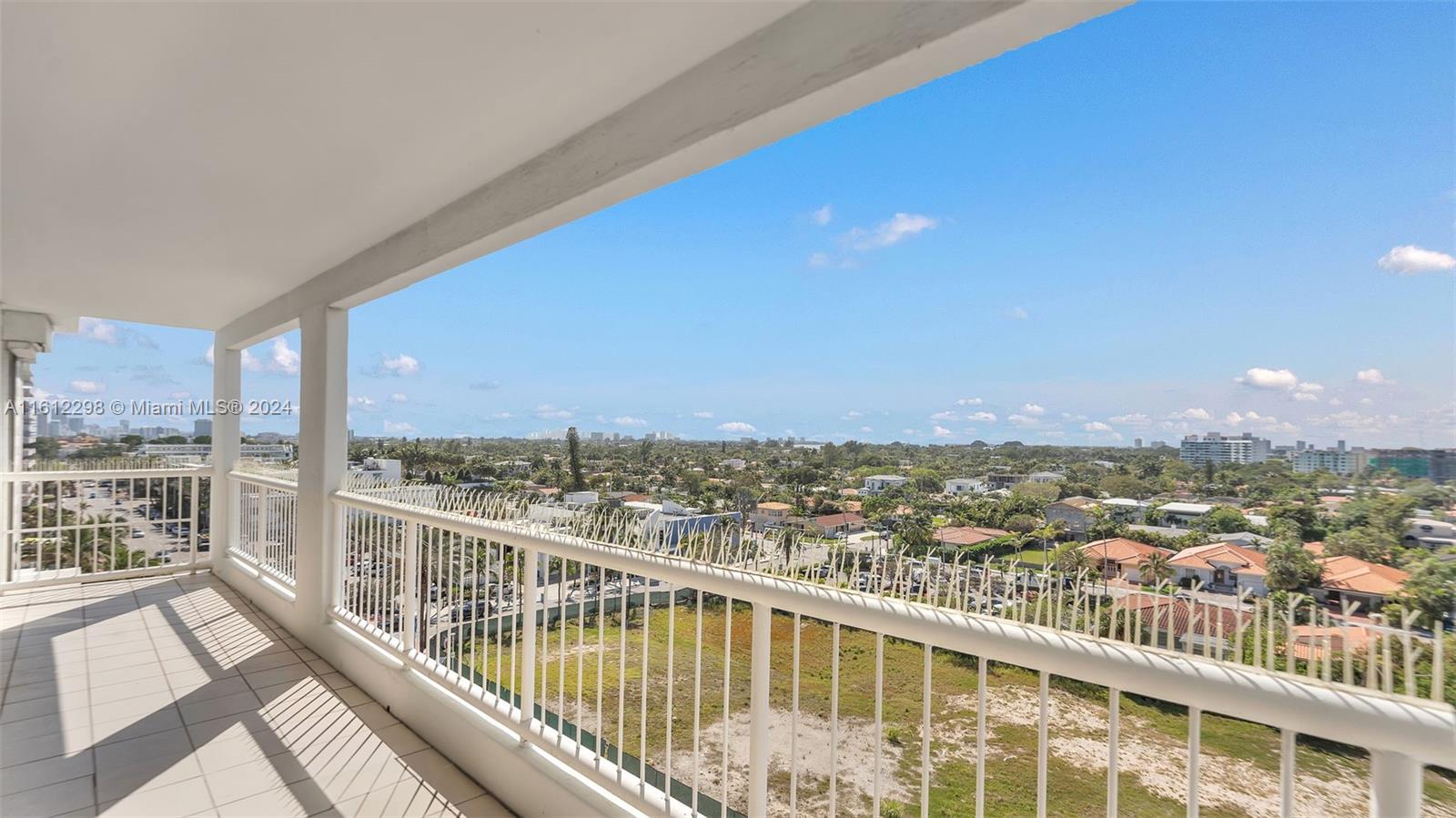 9341 Collins Avenue, Unit 707 Surfside, FL 33154 - Photo 8 of 55 a view of a city from a balcony