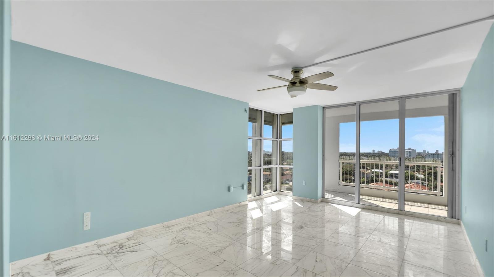 9341 Collins Avenue, Unit 707 Surfside, FL 33154 - Photo 10 of 55 a view of an empty room with a window