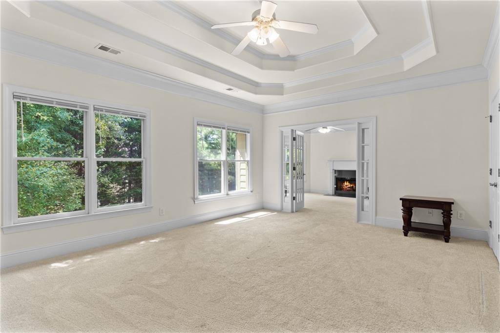 5765 Bailey Ridge Court Johns Creek, GA 30097 - Photo 24 of 51 a view of an empty room with a window