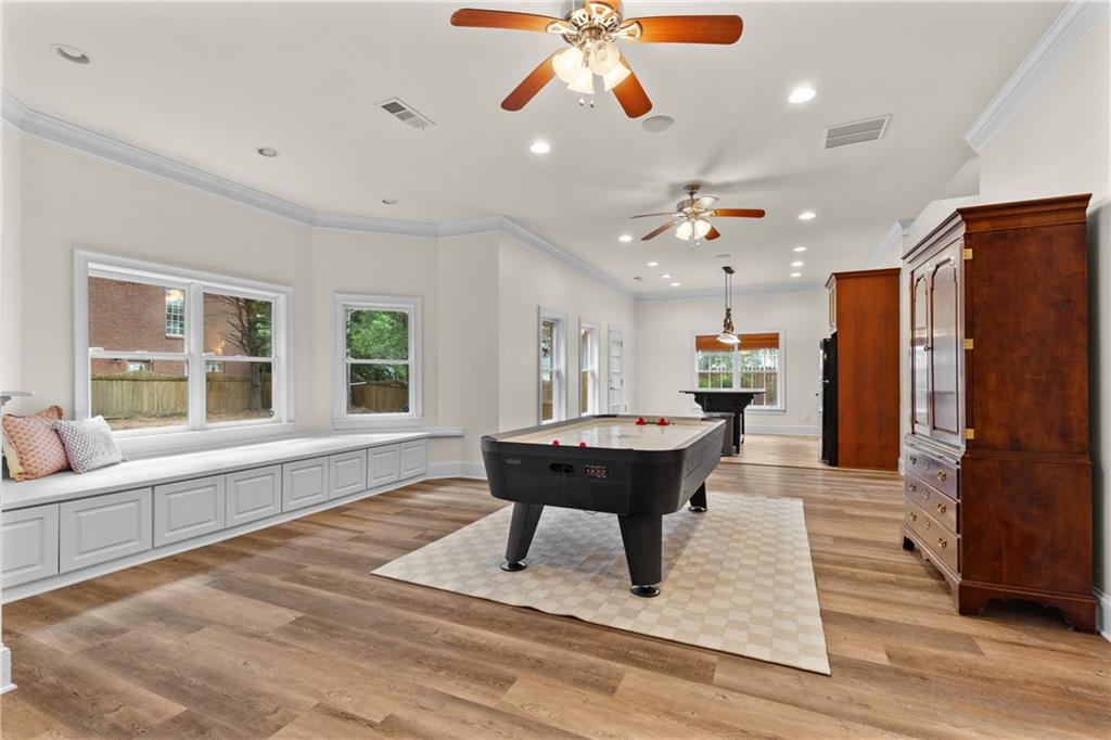 5765 Bailey Ridge Court Johns Creek, GA 30097 - Photo 46 of 51 a view of a dining room with furniture window and wooden floor