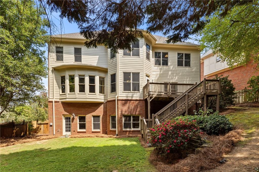5765 Bailey Ridge Court Johns Creek, GA 30097 - Photo 50 of 51 a front view of a house with a yard