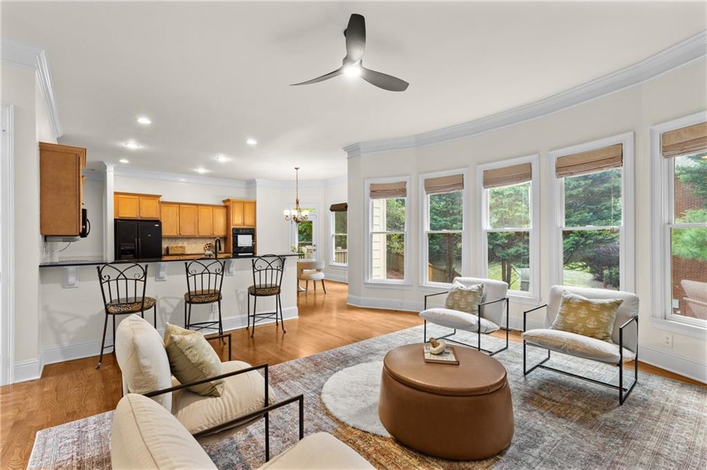 5765 Bailey Ridge Court Johns Creek, GA 30097 - Photo 9 of 51 a living room with furniture and a large window