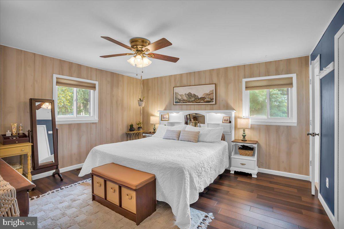 32 Millbridge Road Clementon, NJ 08021 - Photo 11 of 21 a bedroom with a bed chandelier and a window