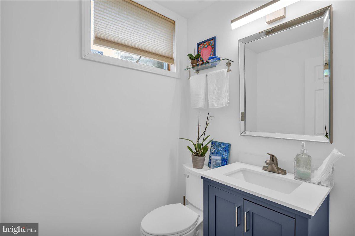 32 Millbridge Road Clementon, NJ 08021 - Photo 13 of 21 a bathroom with a sink vanity mirror and toilet