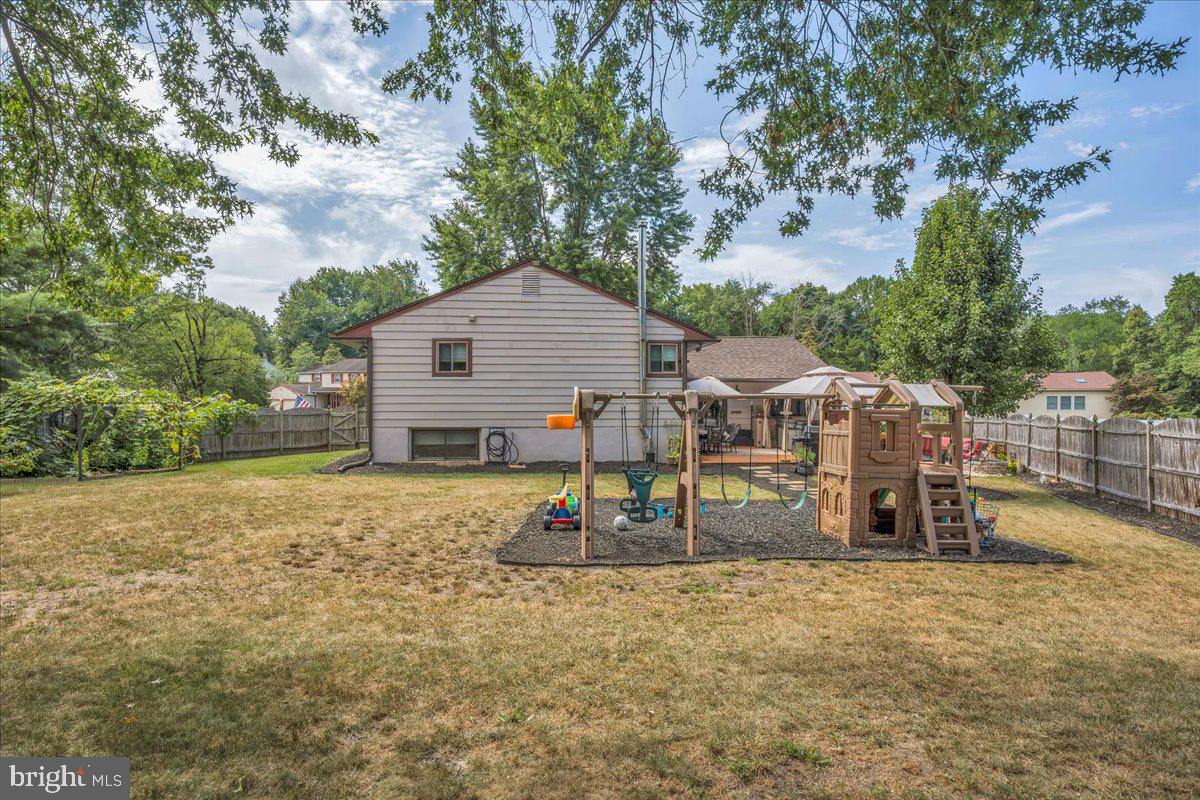 32 Millbridge Road Clementon, NJ 08021 - Photo 16 of 21 a view of a house with a yard