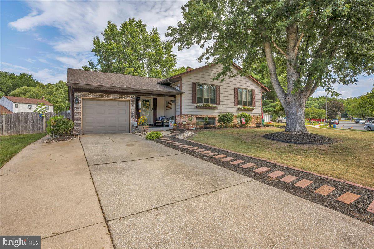 32 Millbridge Road Clementon, NJ 08021 - Photo 2 of 21 a front view of a house with garden