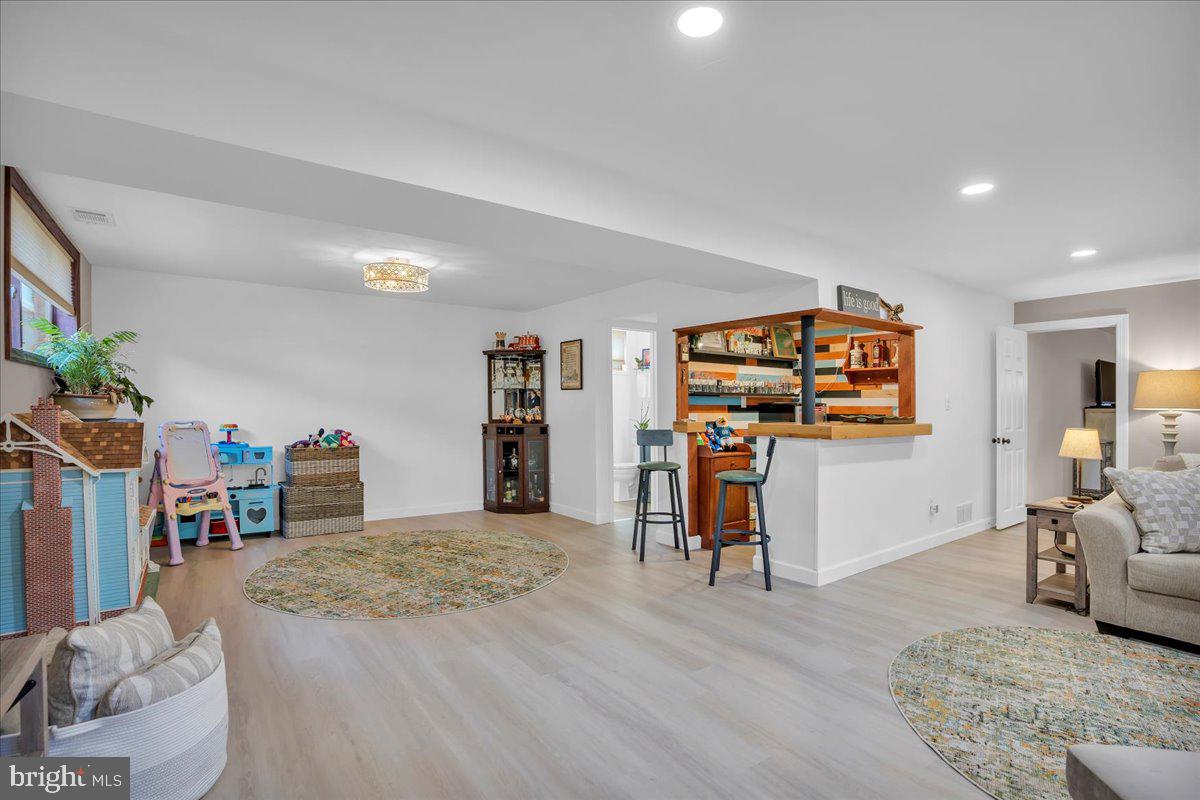 32 Millbridge Road Clementon, NJ 08021 - Photo 4 of 21 a living room with furniture and a flat screen tv