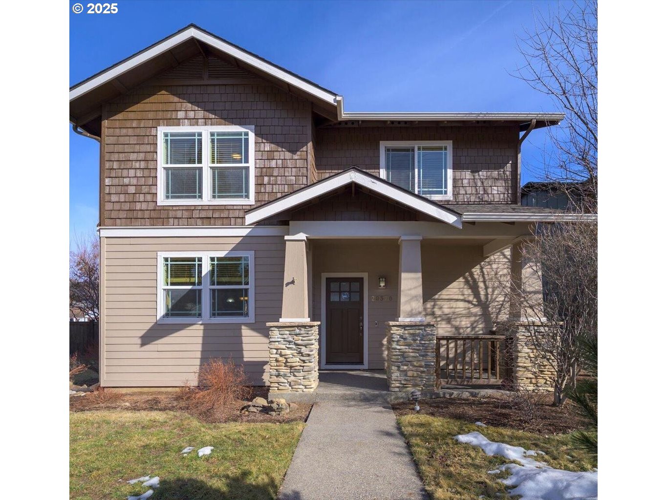 20370 Murphy Road Bend, OR 97702 - Photo 1 of 30 a front view of a house with garden
