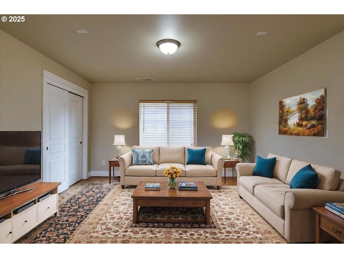 20370 Murphy Road Bend, OR 97702 - Photo 13 of 30 a living room with furniture and a flat screen tv