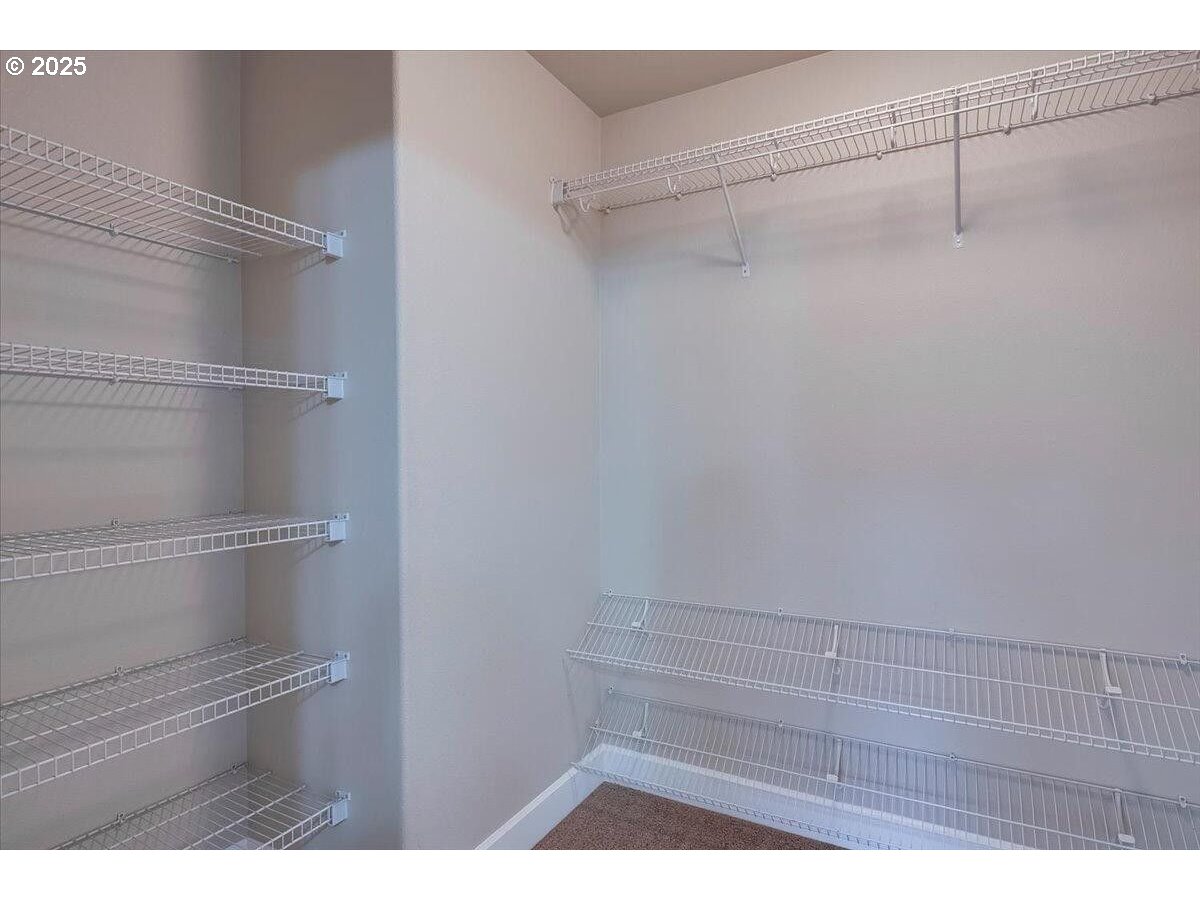 20370 Murphy Road Bend, OR 97702 - Photo 20 of 30 a view of a room with racks on the wall