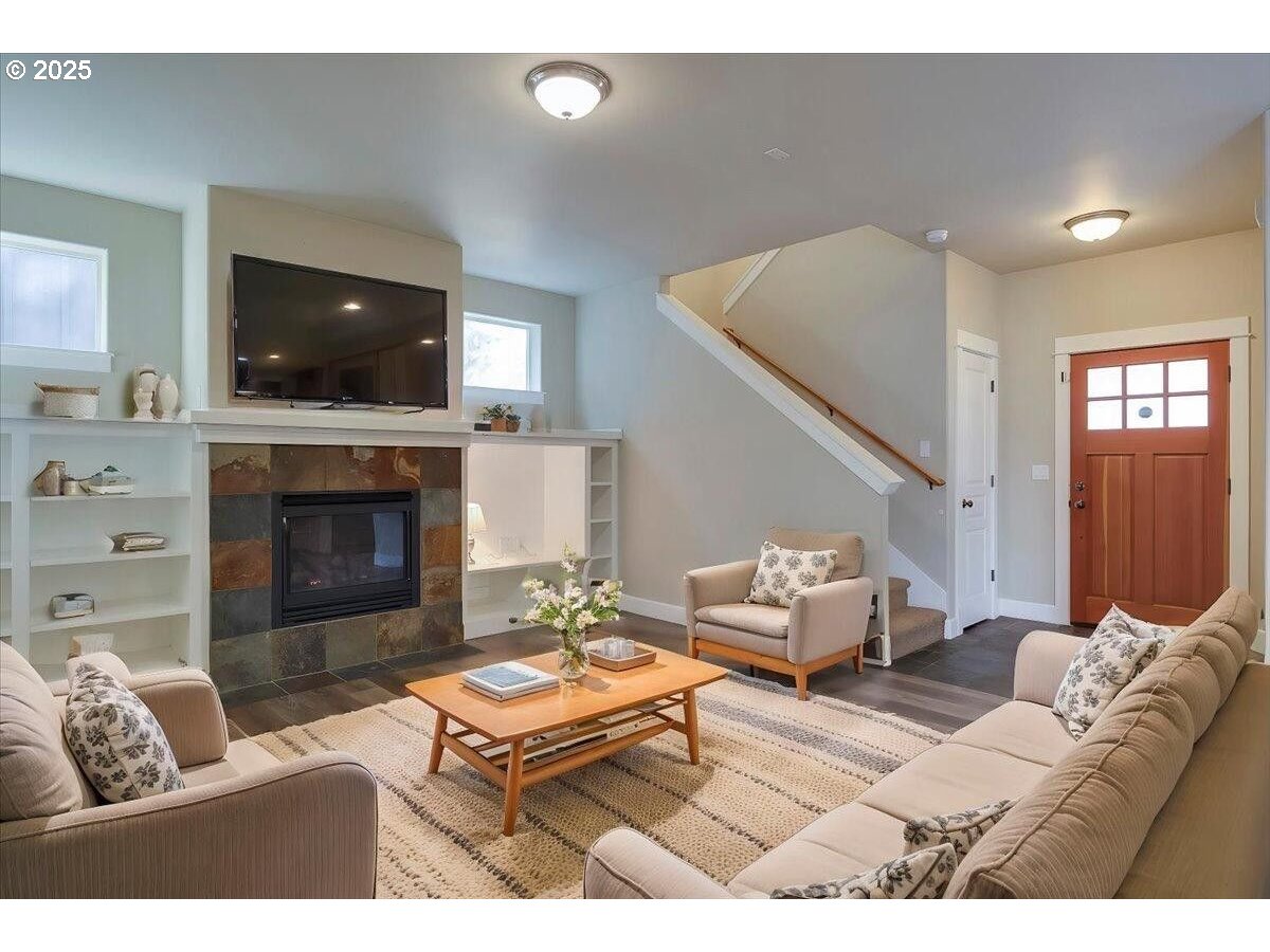 20370 Murphy Road Bend, OR 97702 - Photo 4 of 30 a living room with furniture and a fireplace