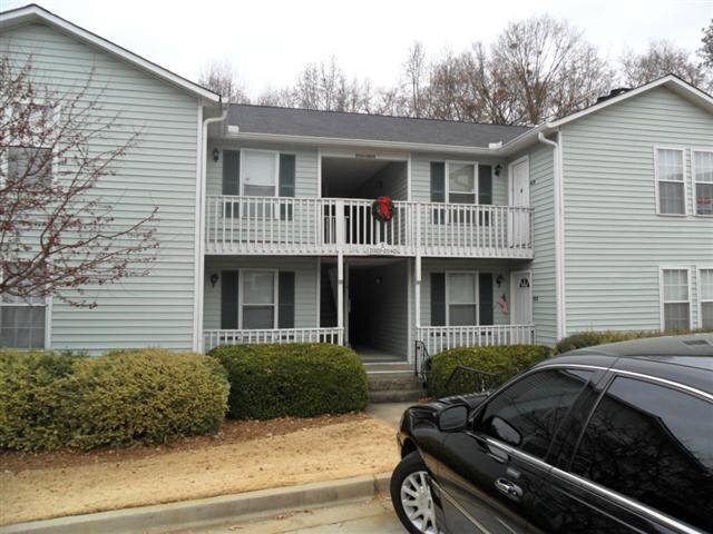 2032 Brian Way Decatur, GA 30033 - Photo 1 of 1 a front view of a house with a garden