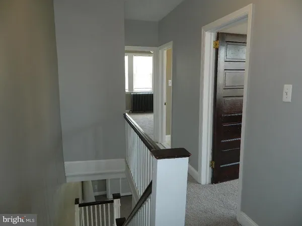 a view of entryway with a front door