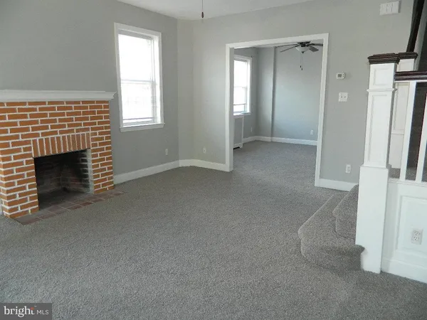 an empty room with windows