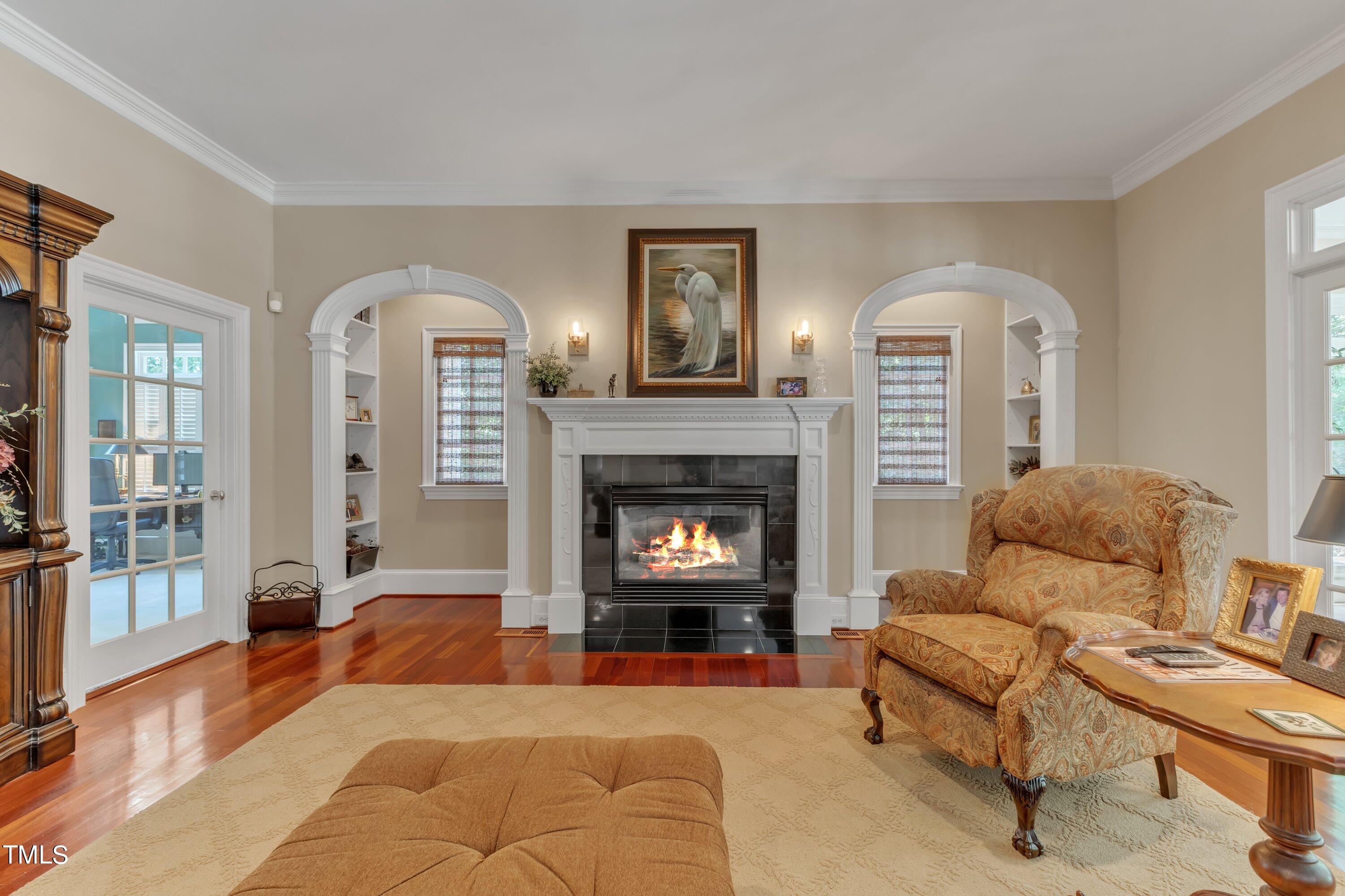 11220 Brass Kettle Road Raleigh, NC 27614 - Photo 18 of 86 a living room with furniture and a fireplace