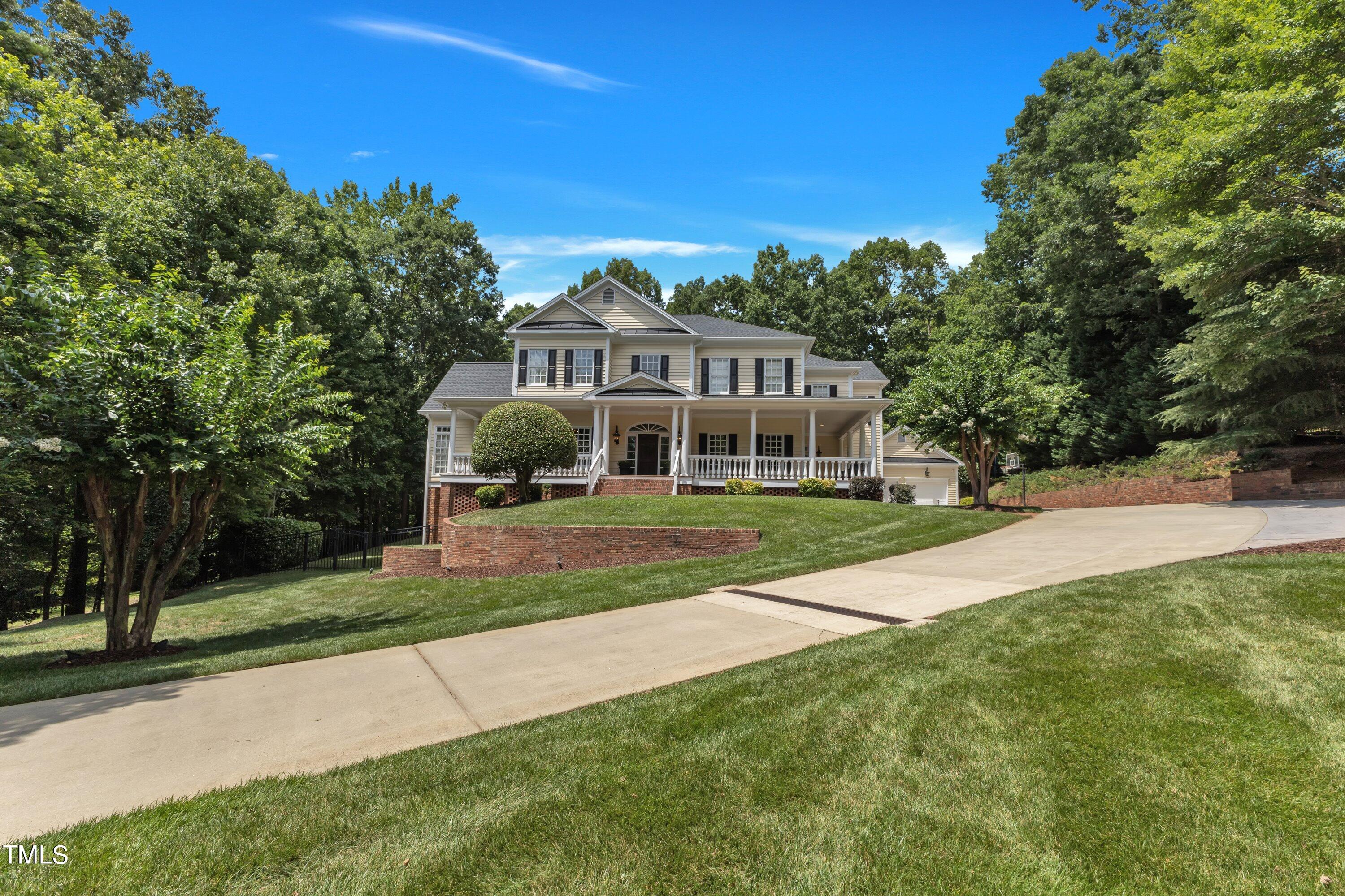 11220 Brass Kettle Road Raleigh, NC 27614 - Photo 2 of 86 a front view of a house with a yard