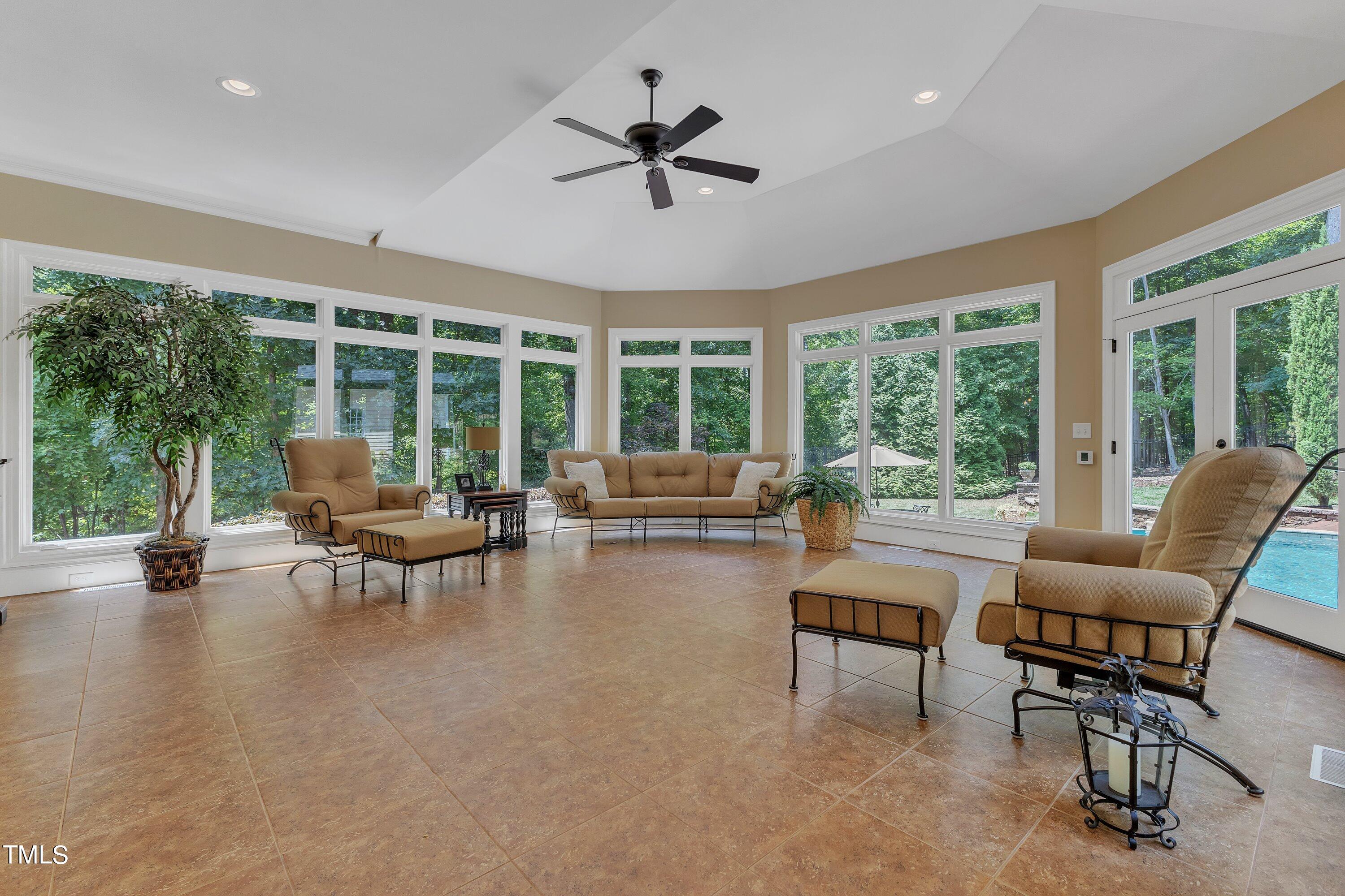 11220 Brass Kettle Road Raleigh, NC 27614 - Photo 28 of 86 a living room with furniture and a large window