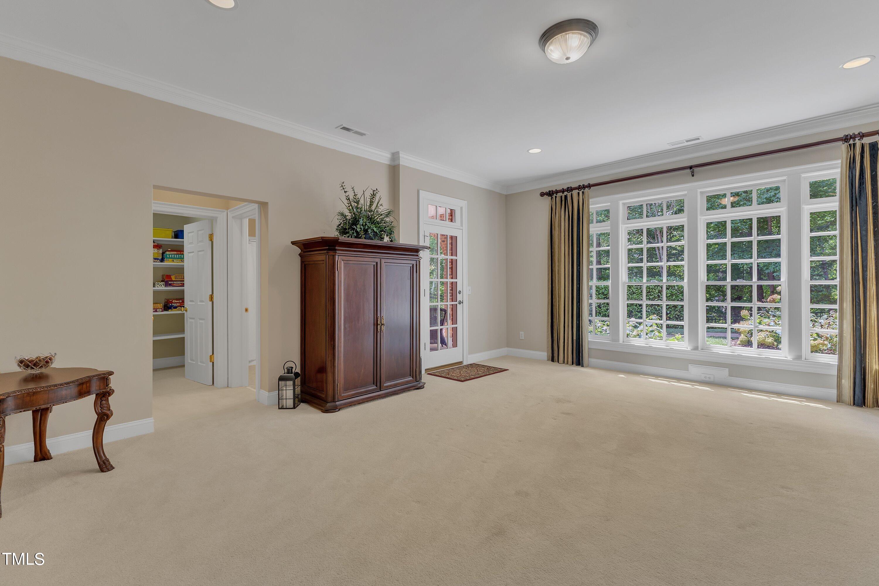 11220 Brass Kettle Road Raleigh, NC 27614 - Photo 60 of 86 a view of an empty room with a window