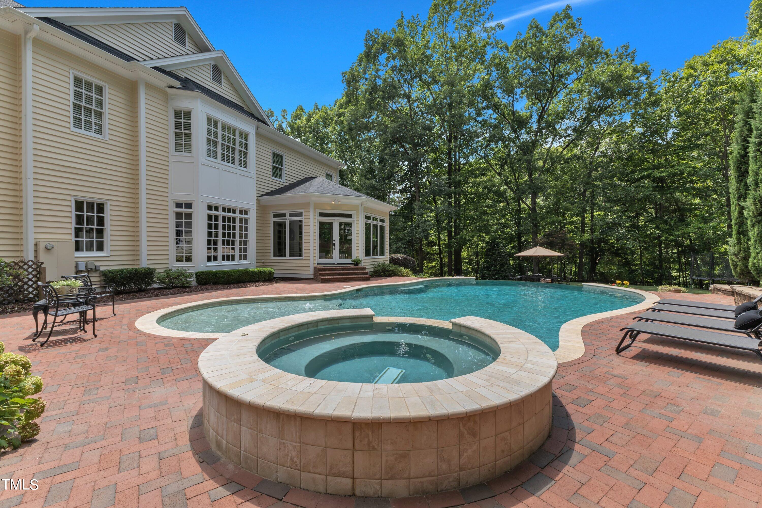 11220 Brass Kettle Road Raleigh, NC 27614 - Photo 69 of 86 a view of a house with swimming pool and sitting area