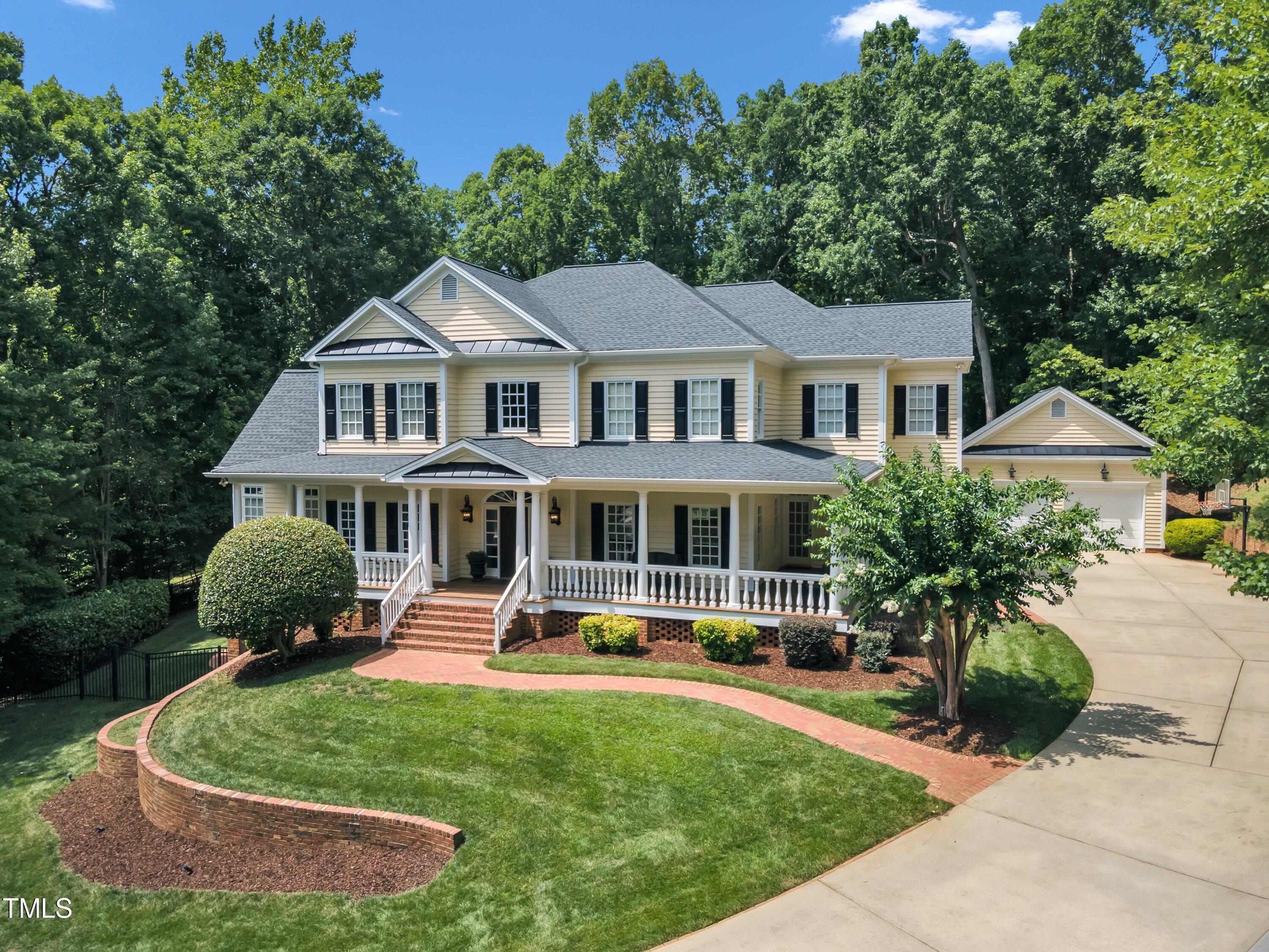 11220 Brass Kettle Road Raleigh, NC 27614 - Photo 79 of 86 a front view of a house with a yard