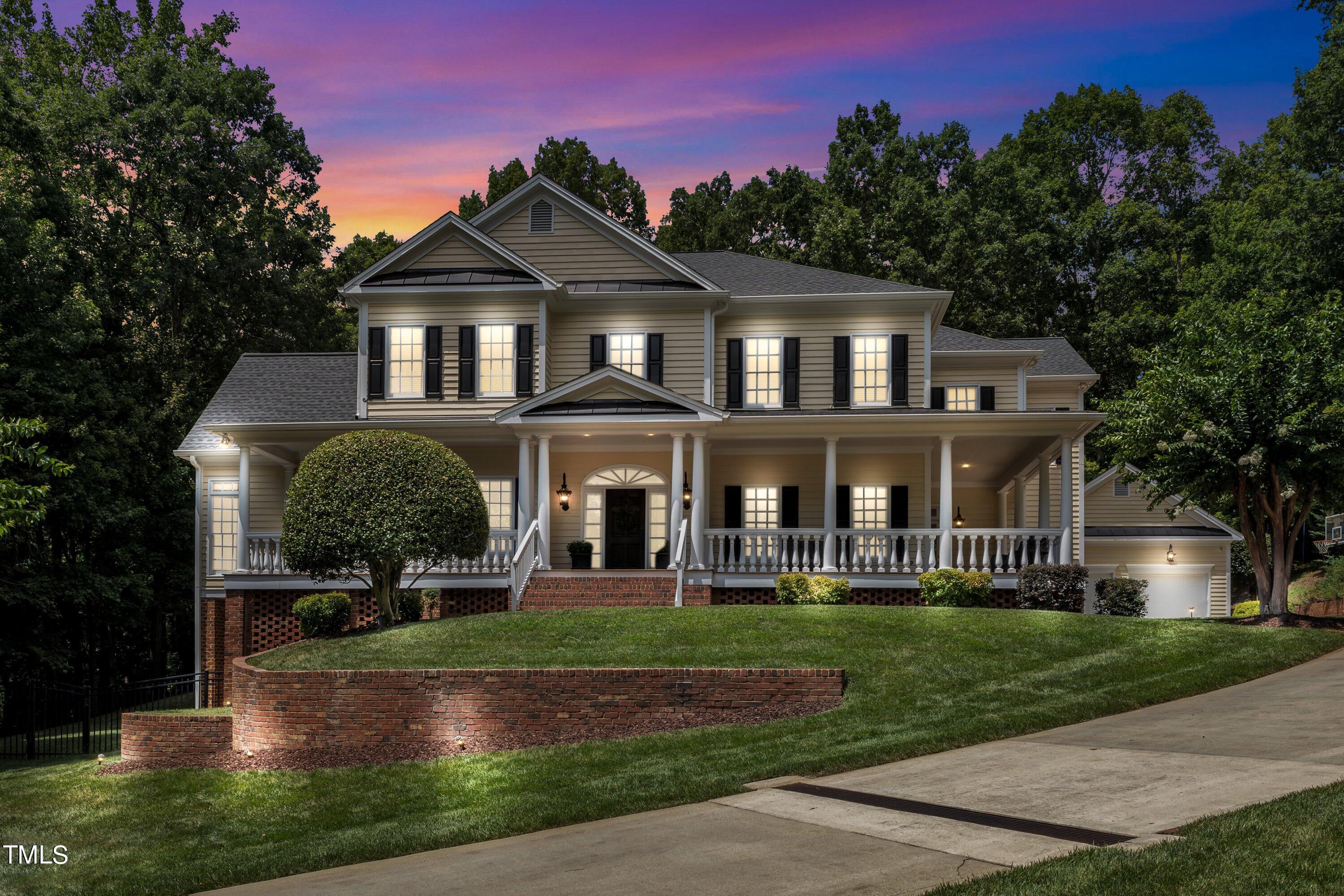 11220 Brass Kettle Road Raleigh, NC 27614 - Photo 84 of 86 a front view of a house with a yard