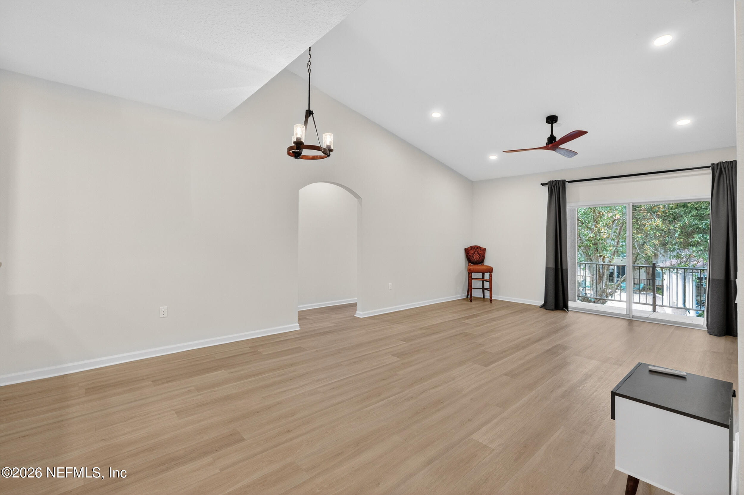5663 Greenland Road, Unit 1304 Jacksonville, FL 32258 - Photo 18 of 41 a view of empty room with wooden floor and fan