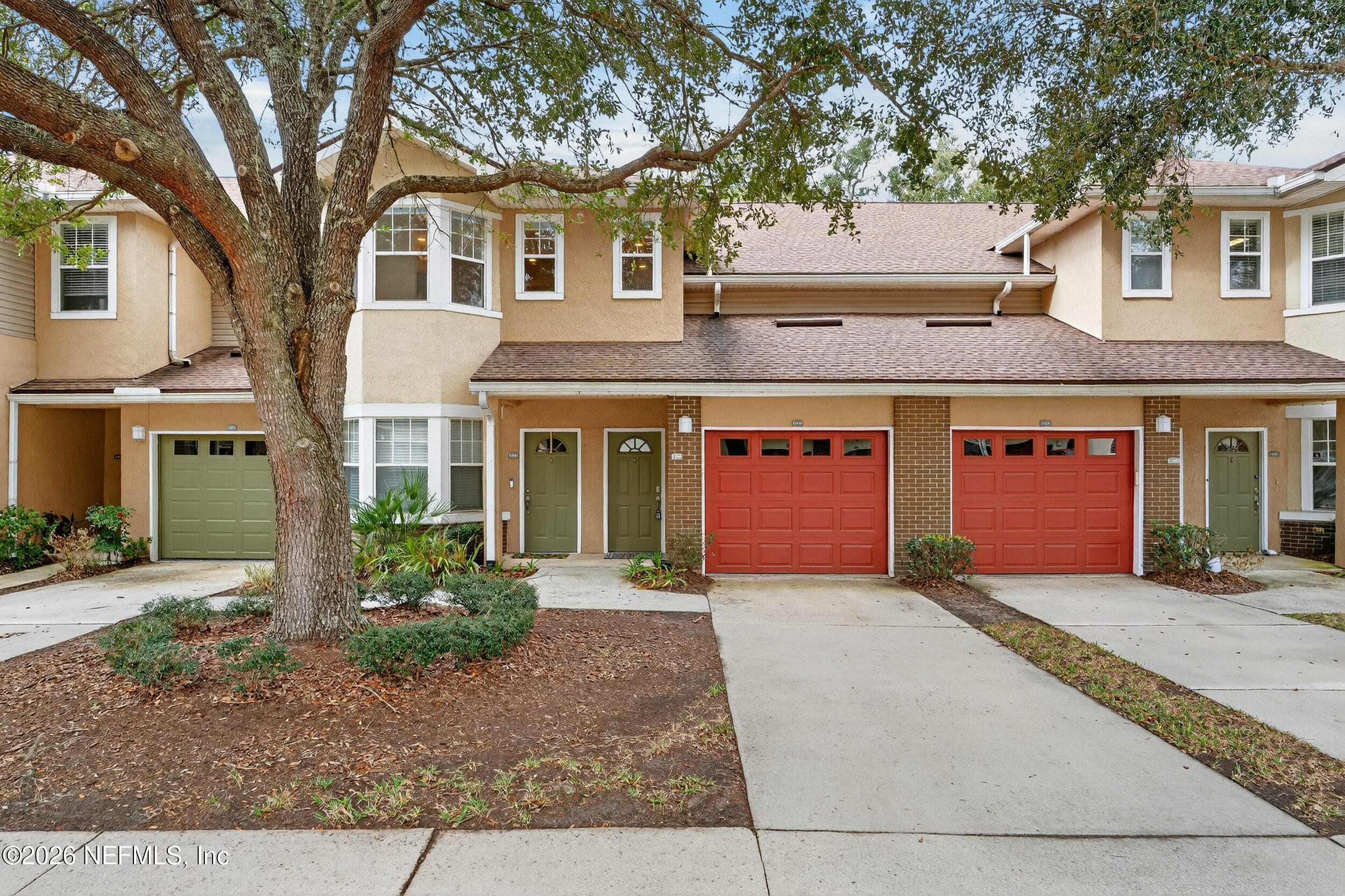 5663 Greenland Road, Unit 1304 Jacksonville, FL 32258 - Photo 2 of 41 front view of a house with a yard