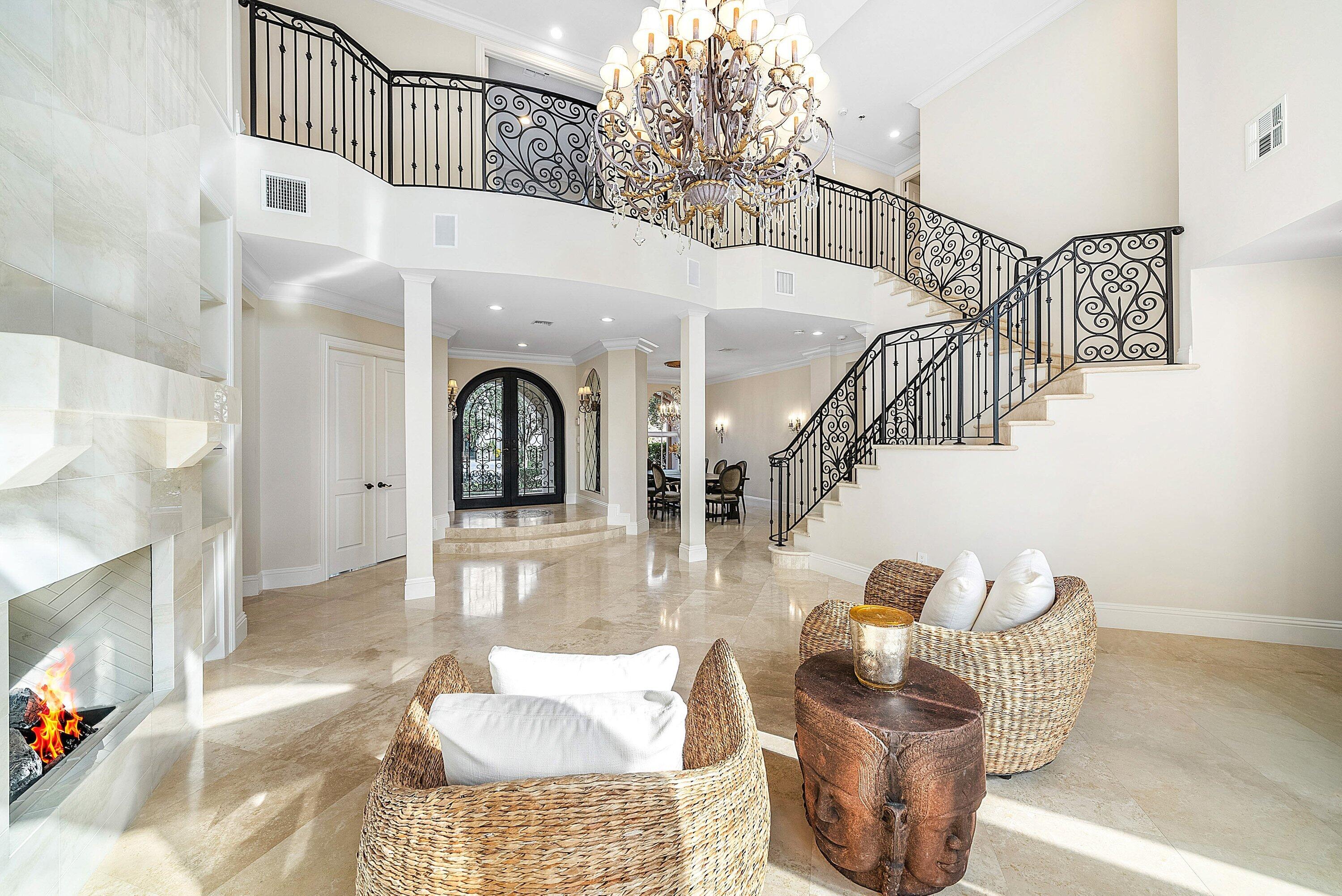 398 Northeast 7th Street Boca Raton, FL 33432 - Photo 11 of 74 a living room with furniture and a rug
