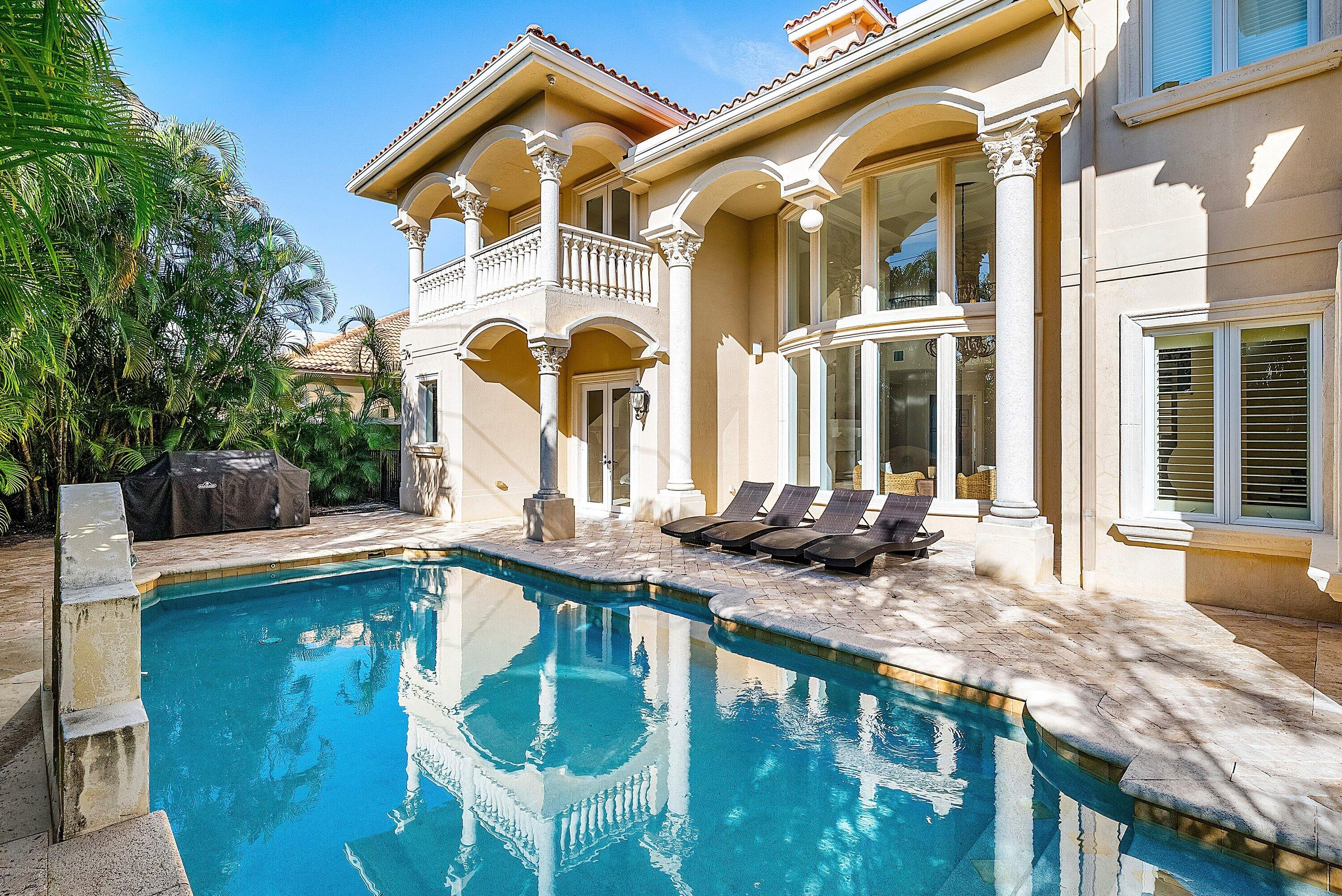398 Northeast 7th Street Boca Raton, FL 33432 - Photo 66 of 74 a view of a house with backyard porch and sitting area