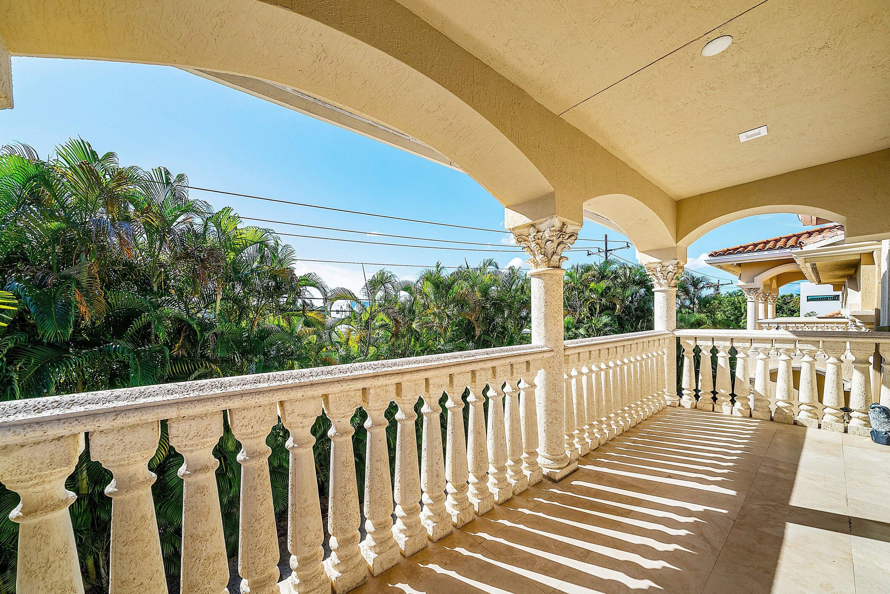 398 Northeast 7th Street Boca Raton, FL 33432 - Photo 69 of 74 a view of a two chairs and table in the balcony