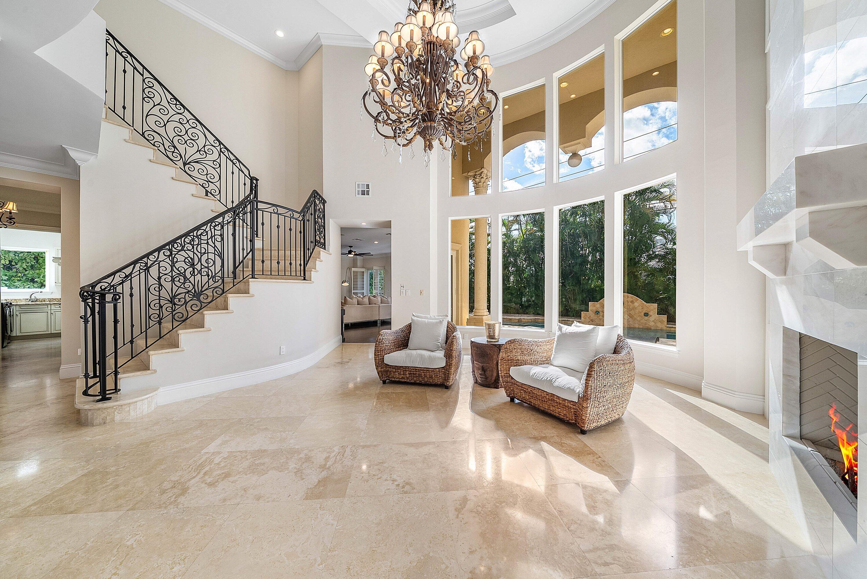 398 Northeast 7th Street Boca Raton, FL 33432 - Photo 7 of 74 a view of entryway livingroom and hall with wooden floor