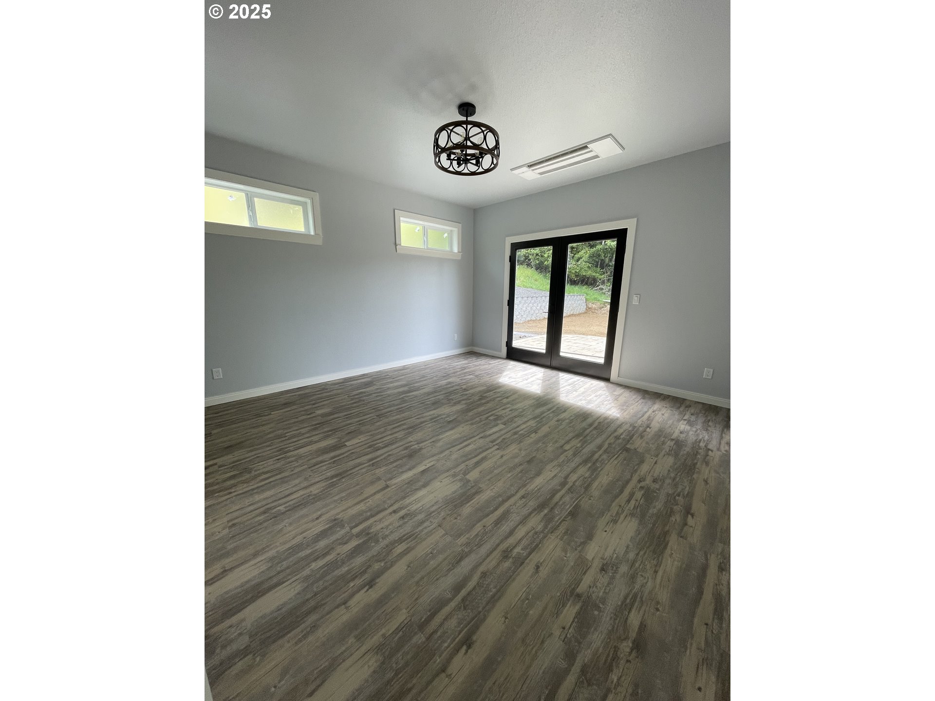 905 Bellevue Drive Reedsport, OR 97467 - Photo 13 of 37 a view of an empty room and window