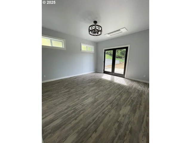 a view of an empty room and window