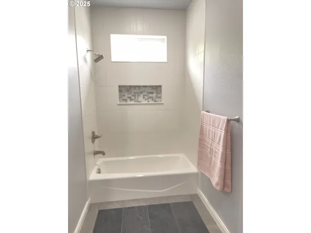 a bathroom with a bathtub