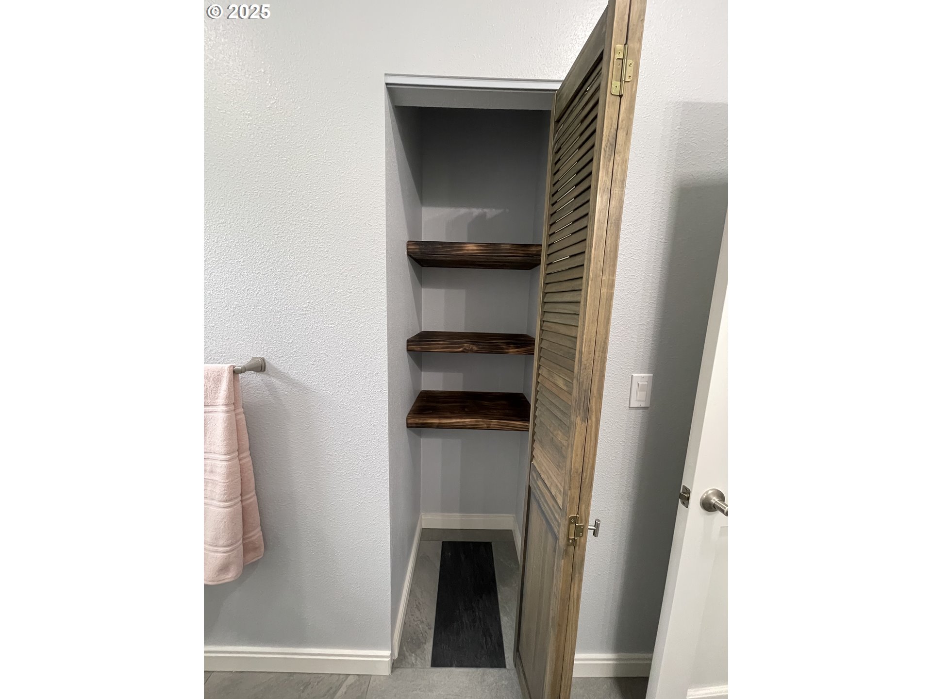 905 Bellevue Drive Reedsport, OR 97467 - Photo 33 of 37 a way to rooms with wooden floor