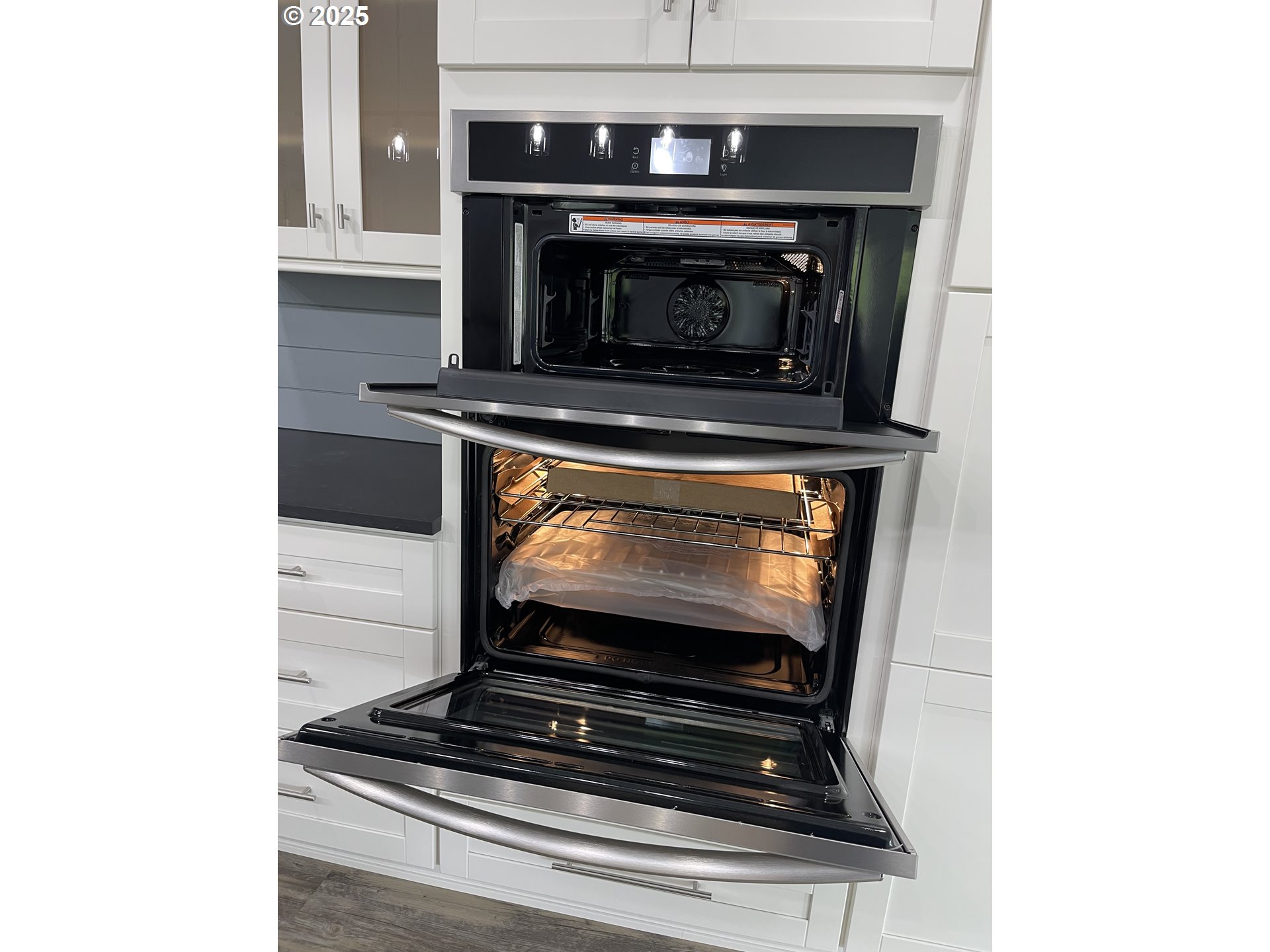 905 Bellevue Drive Reedsport, OR 97467 - Photo 10 of 37 a stove top oven sitting inside of a kitchen