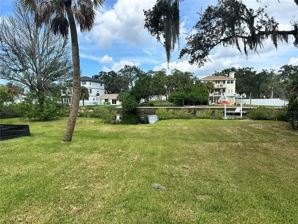 a view of a park with swings and slides