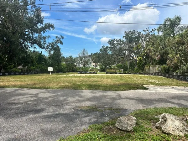 a view of a golf course with a lake