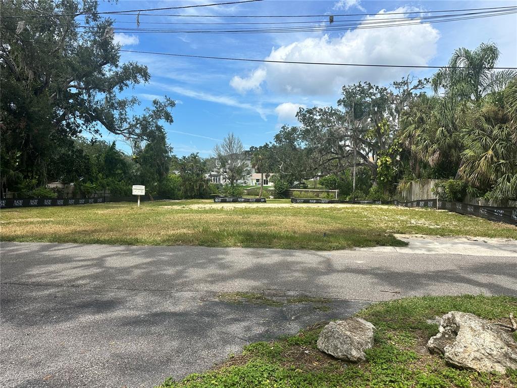 5649 Tidalwave Drive New Port Richey, FL 34652 - Photo 2 of 7 a view of a golf course with a lake