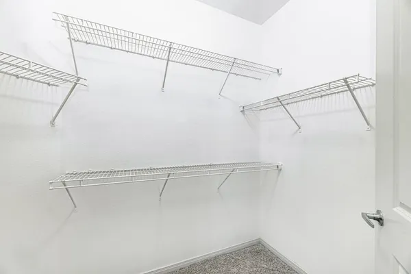 a view of a room with racks on the wall