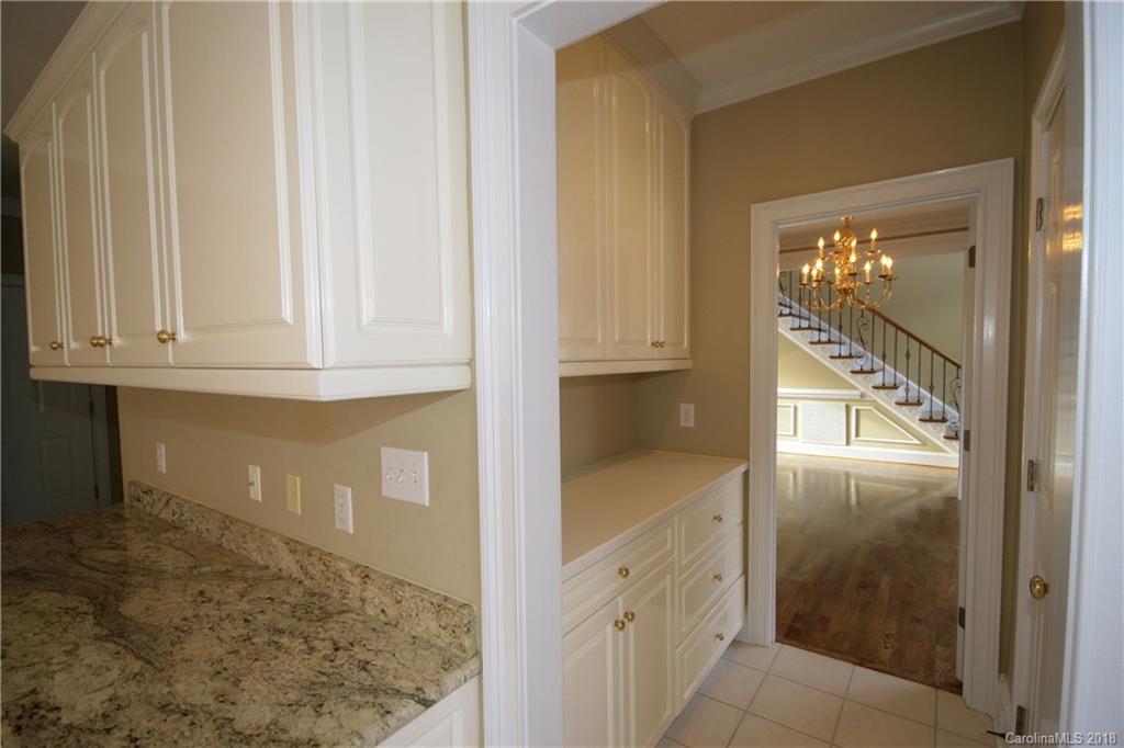 18628 Square Sail Road Cornelius, NC 28031 - Photo 11 of 19 a view of cabinets and entryway